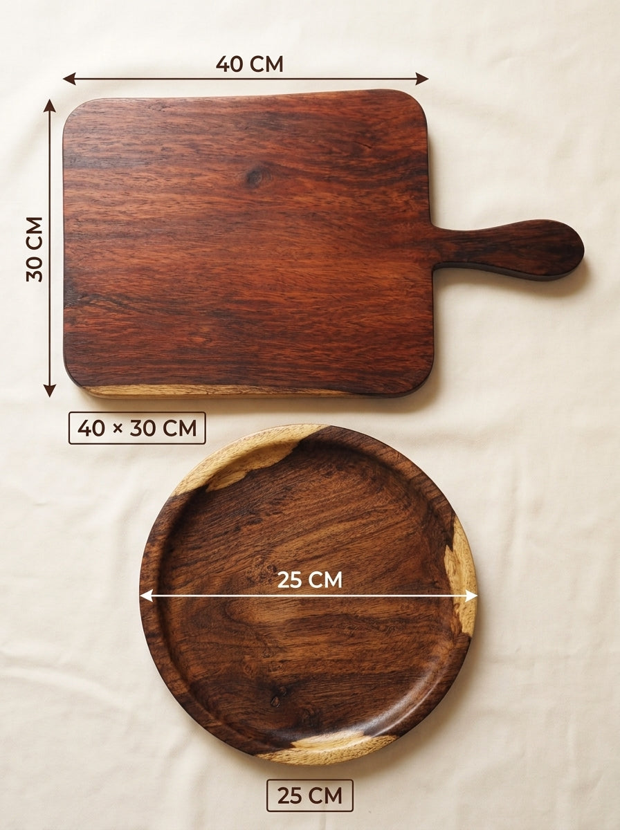 Two wooden serving boards shown on a light fabric background with overlaid dimension labels: a rectangular board with a handle measuring 40 cm by 30 cm, and a round board measuring 25 cm by 25 cm.